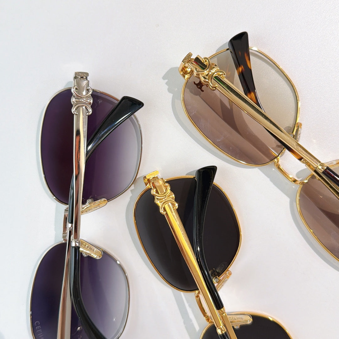 Set of sunglasses with purple and brown lenses in gold and silver frames