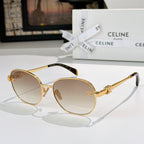 Gold-tone round sunglasses with light-pink lenses and gold emblem on temple
