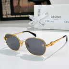 Gold-tone round sunglasses with dark lenses and gold crest detail on temple