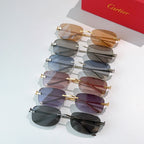 Set of Cartier glasses with assorted frame colors and tinted lenses, stacked arrangement