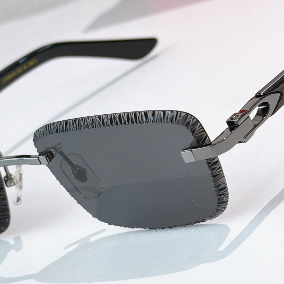 Single fashion glasses view with dark frame and large gray-tinted lens, patterned temple