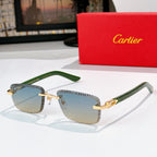 Fashion glasses with green frames and light tinted lenses, gold-tone hinge details