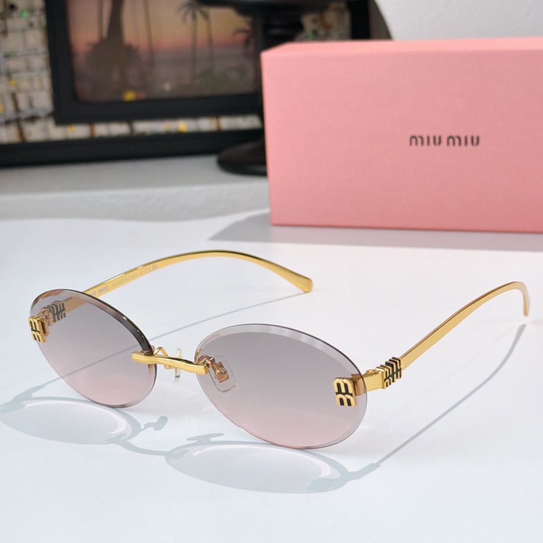 Sunglasses with gold metal round frames and light rose gradient lenses.