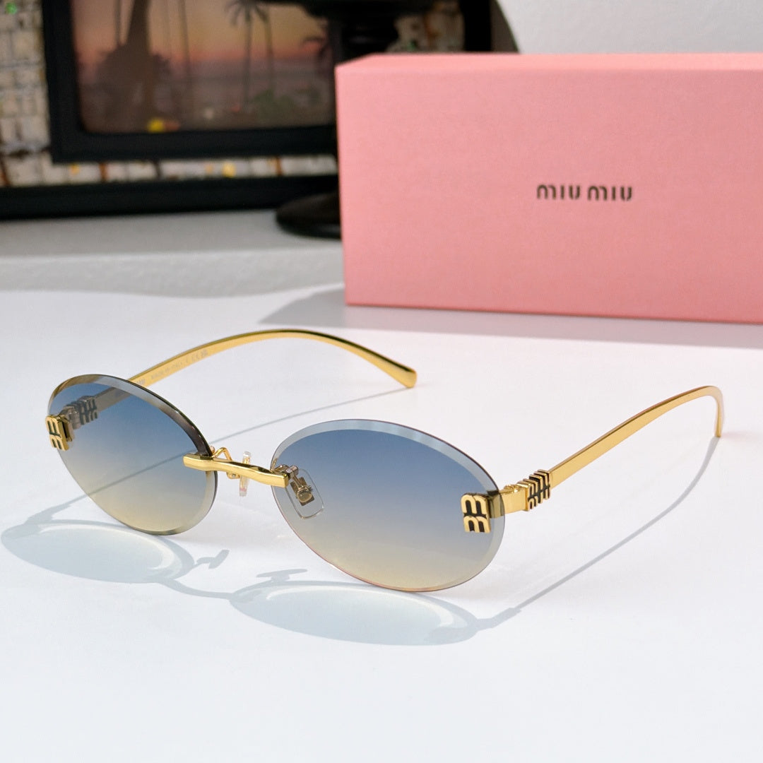 Sunglasses with gold metal round frames and light blue gradient lenses.