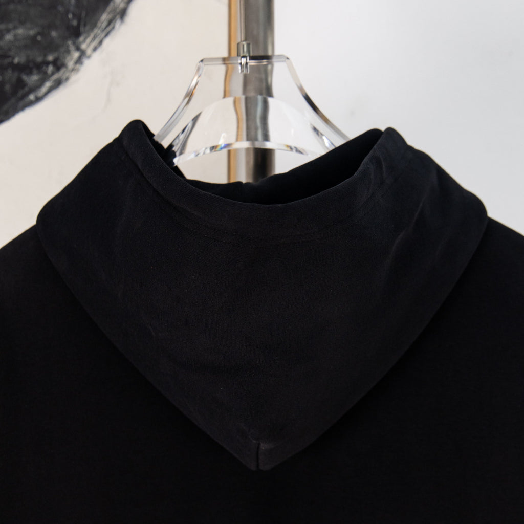 Black hooded sweatshirt with front kangaroo pocket and drawstring hood