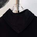 Black hooded sweatshirt with front kangaroo pocket and drawstring hood
