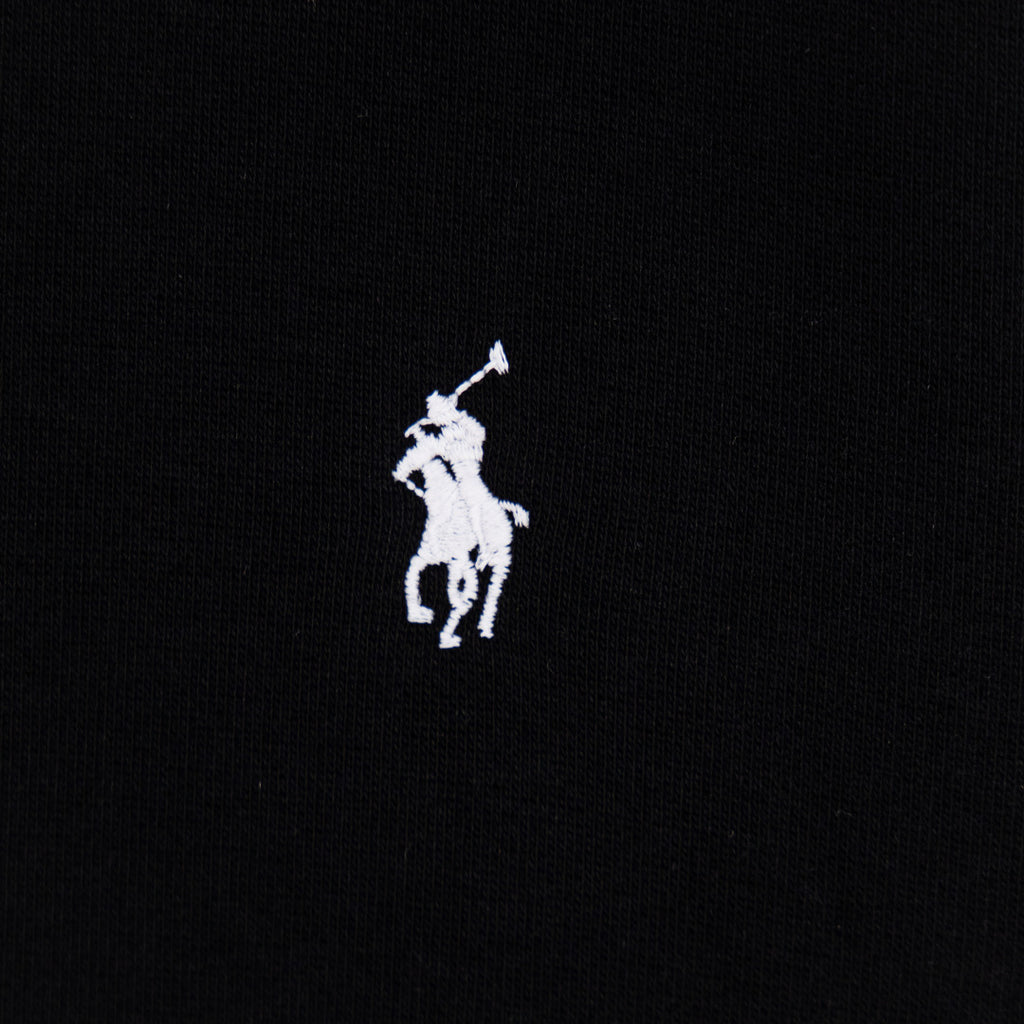 Black hoodie front chest with small white Polo rider logo