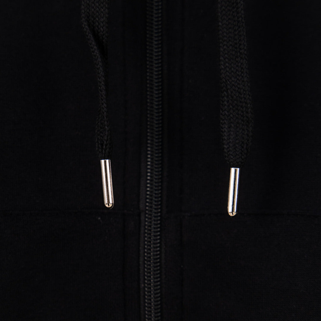 Black hoodie close-up of two silver zipper pulls on the front opening
