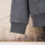 Heather gray hoodie sleeve cuff and hem with ribbed trim