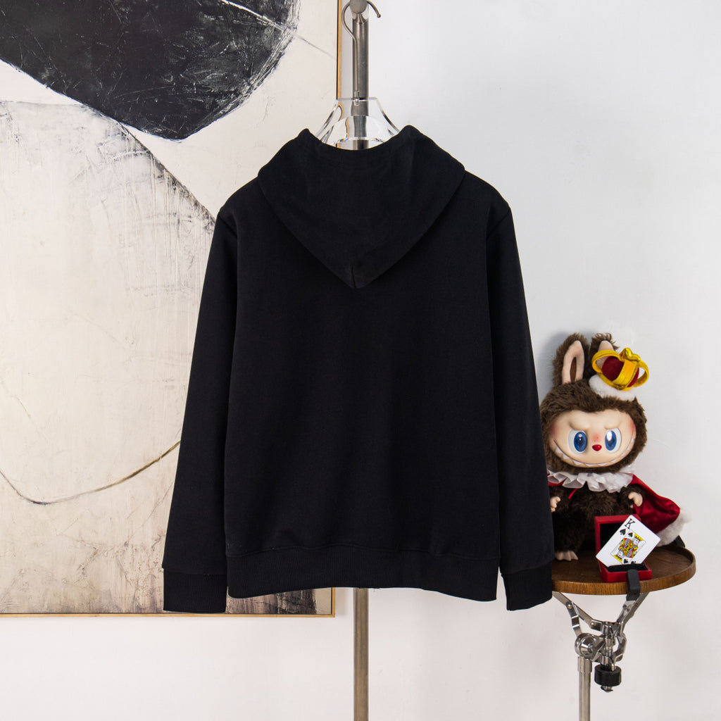 Black zip-up hooded sweatshirt on hanger, long sleeves
