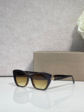 Bvlgari sunglasses, black frame with brown-tinted lenses and gold emblem detail