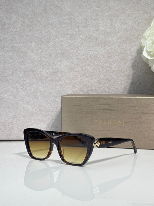 Bvlgari sunglasses, black frame with brown-tinted lenses and gold emblem detail
