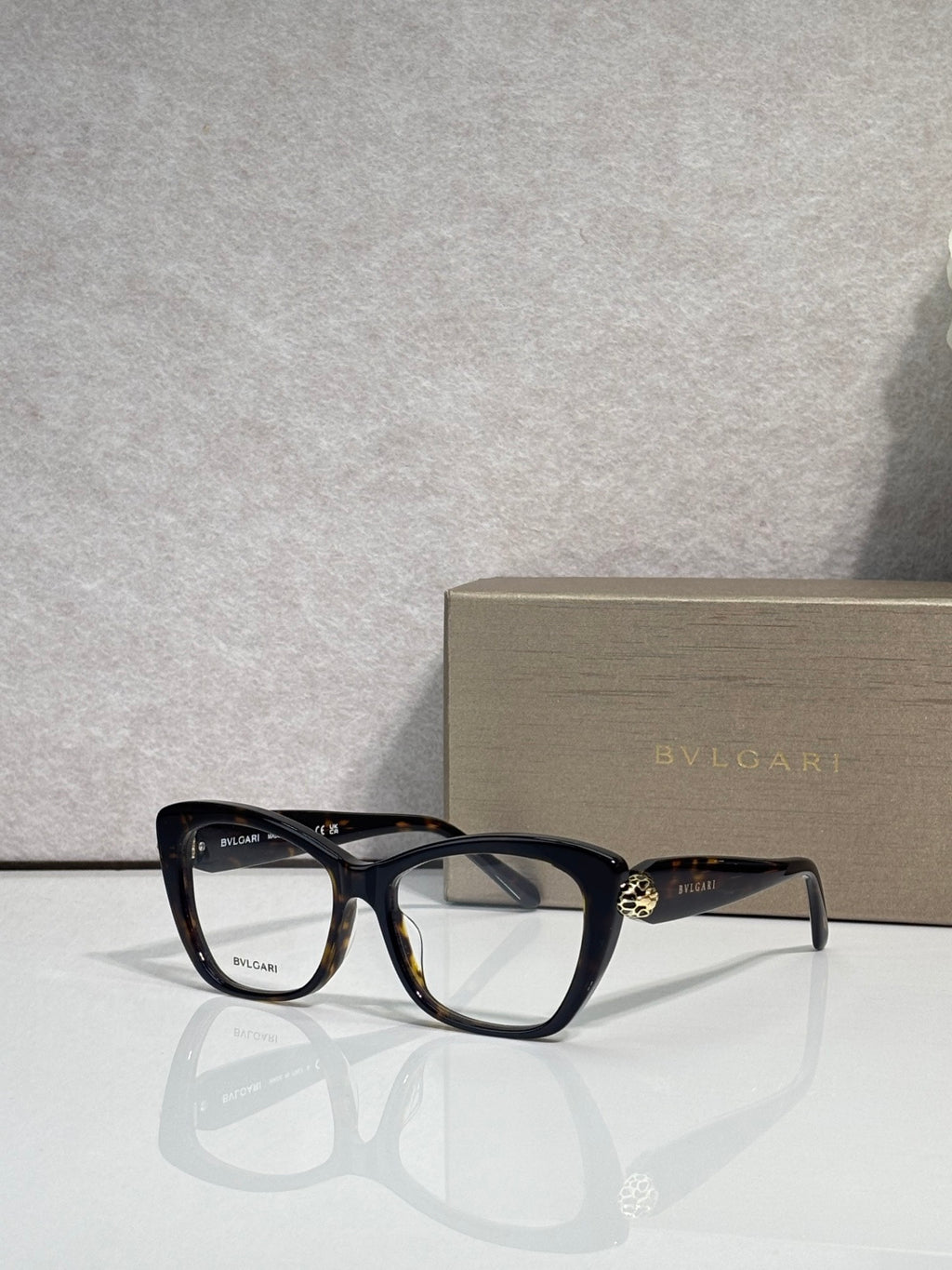 Bvlgari eyeglasses, black frame with clear lenses and gold side emblem