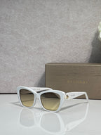 Bvlgari sunglasses, white frame with yellow-brown tinted lenses and gold hinge detail