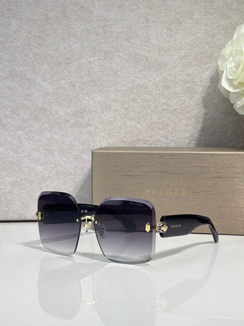 Bvlgari dark blue gradient sunglasses with gold-tone bridge and temple hardware