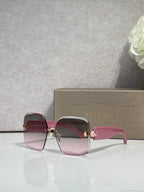 Bvlgari pink gradient sunglasses with gold-tone hinges and logo on temples