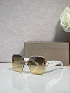 Bvlgari light gold gradient sunglasses with gold-tone hinges and logo temples
