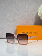 Louis Vuitton square sunglasses with dark lenses and blush-pink frame, logo on arms