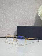 Dior eyeglasses with clear lenses, gold bridge detail, angled side view