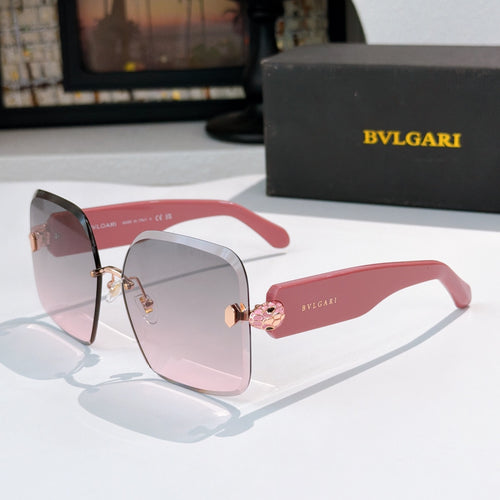 Bvlgari pink-accent sunglasses with pale tinted lenses and gold logo hinge medallion