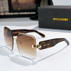 Bvlgari tortoiseshell sunglasses with brown tinted lenses and gold logo hinge medallion