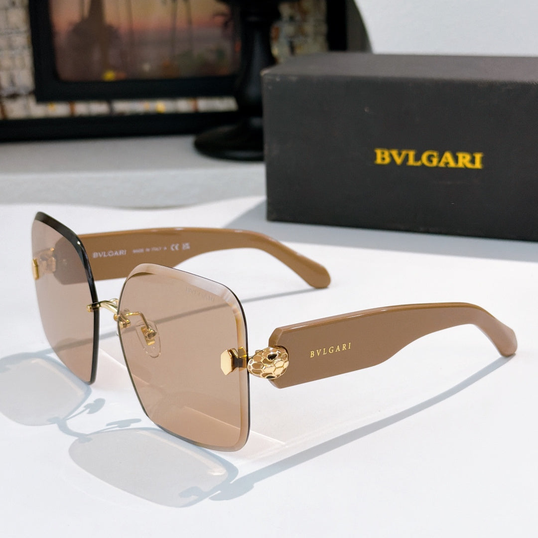 Bvlgari dark sunglasses with tan lenses and gold logo hinge medallion