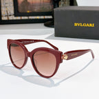 Sunglasses with burgundy frames and pink tinted lenses, BVLGARI side logo