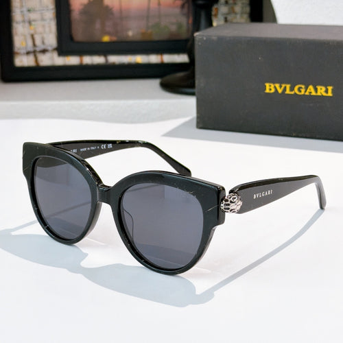 Sunglasses with black frames and dark tinted lenses, BVLGARI side logo