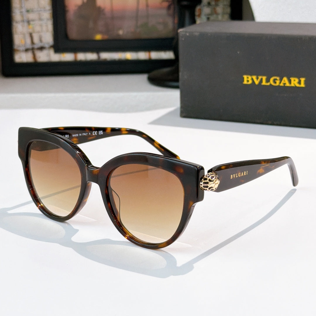 Sunglasses with tortoiseshell frames and amber tinted lenses, BVLGARI side logo