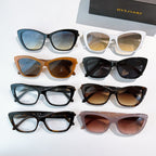 Assorted cat-eye glasses in multiple frame colors with tinted and clear lenses