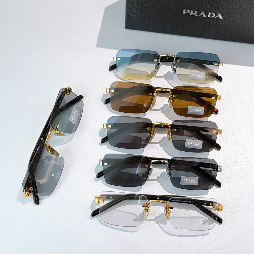Prada eyeglasses set on display with blue, amber, and dark lens options