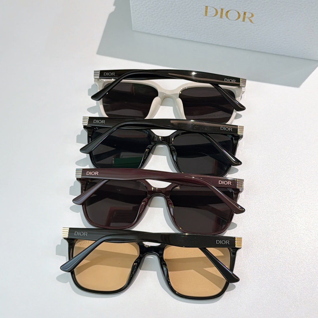 Set of four cat-eye sunglasses with tinted lenses in black, cream, brown, and amber tones