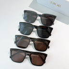 Set of Dior sunglasses with dark, brown, and blue-tinted lenses and black frames
