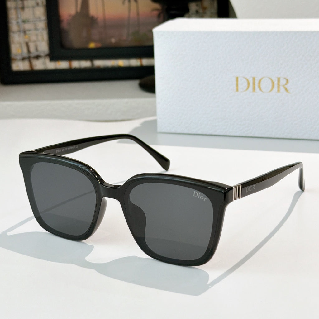 Dior sunglasses, black frame with dark smoke lenses and gold-tone hinge