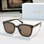 Dior sunglasses, dark frame with brown gradient lenses and gold-tone hinge
