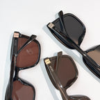 Assorted Dior sunglasses with tinted lenses in black and brown frames