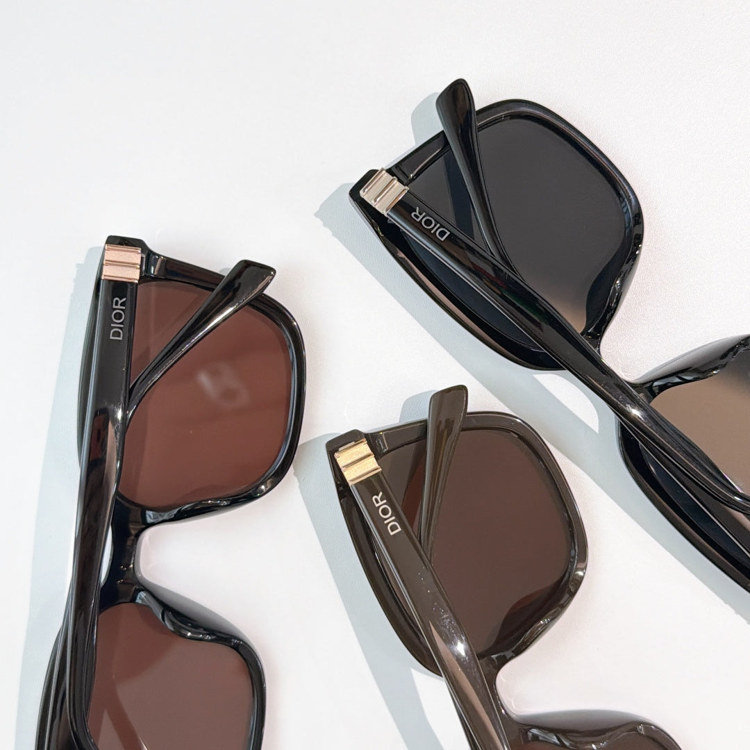 Assorted Dior sunglasses with tinted lenses in black and brown frames