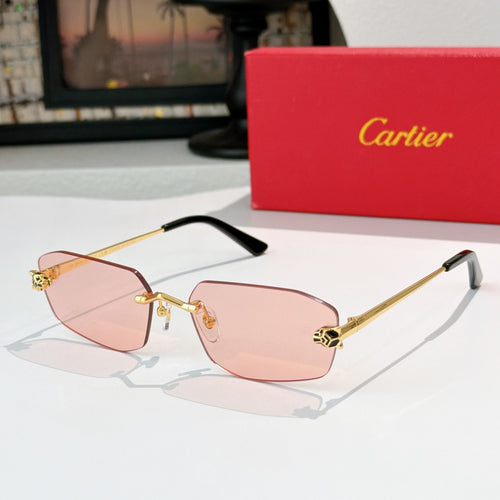 Cartier eyeglasses with pink tinted lenses and gold metal frame, black temple tips.