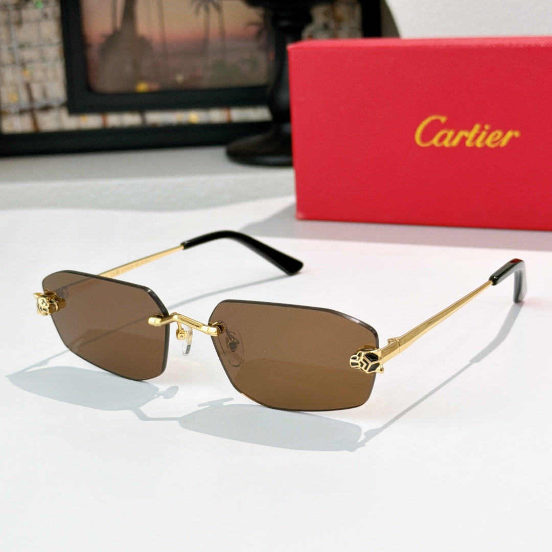 Cartier eyeglasses with brown tinted lenses and gold metal frame, black temple tips.