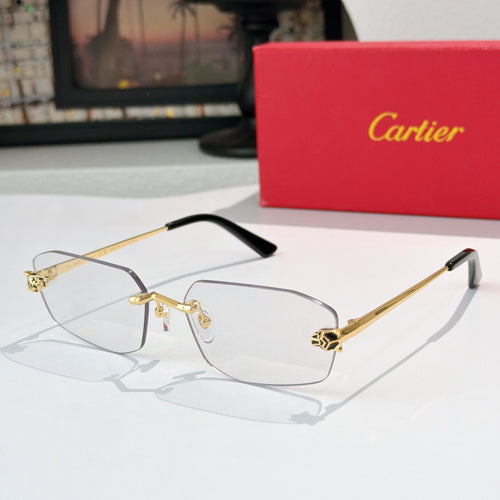 Cartier eyeglasses with clear lenses and gold metal frame, black temple tips.