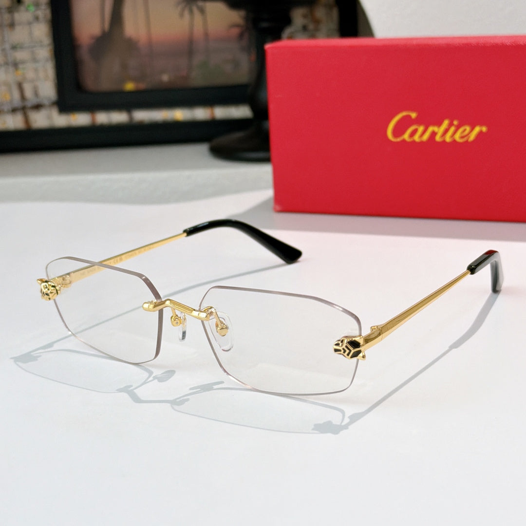 Cartier eyeglasses with clear lenses and gold metal frame, black temple arms.
