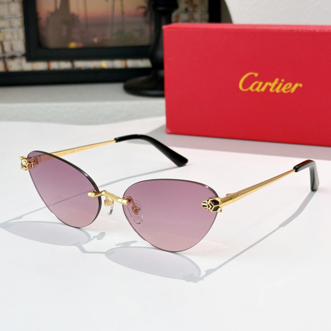 Gold-tone sunglasses with purple-tinted lenses and black temple tips, slim cat-eye frame
