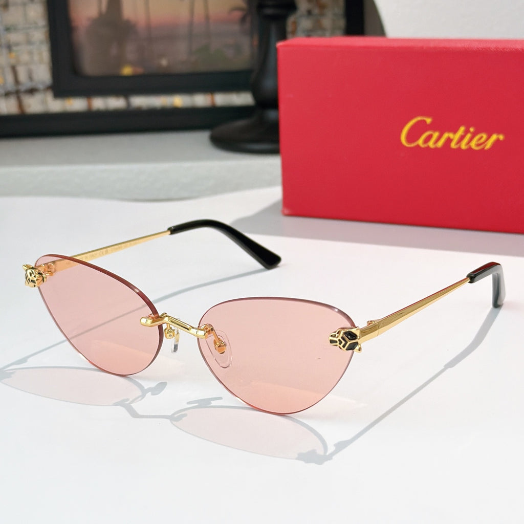 Gold-tone sunglasses with pink-tinted lenses and black temple tips, slim cat-eye frame
