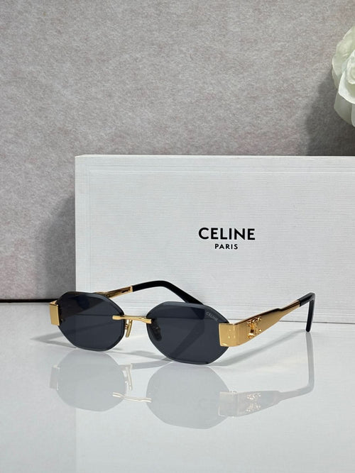 Celine oval sunglasses with black frame accents and dark gray lenses
