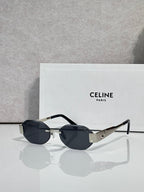 Celine oval sunglasses with black frame and dark lenses