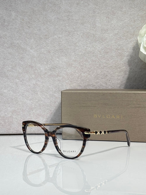 Bvlgari eyeglasses with brown tortoise frame and gold logo temple details