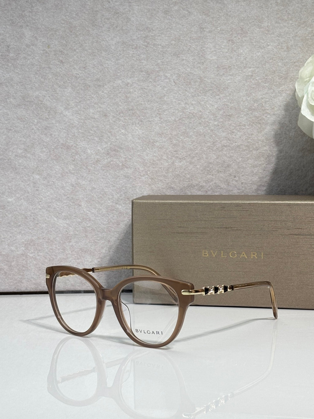 Bvlgari eyeglasses with brown acetate round frame and gold temple detail