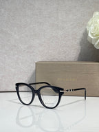 Bvlgari eyeglasses with black round frame and gold temple accents