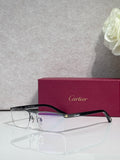 Cartier eyeglasses with dark frames, clear lenses, and gold temple accents