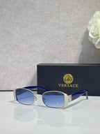 Versace glasses with silver frame, blue tinted lenses, and blue temples